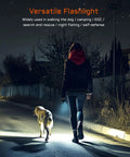 Person walking dog at night using TAC 2AA EDC Tactical Dual Modes Flashlight With Dual Switches, 1400 High Lumen