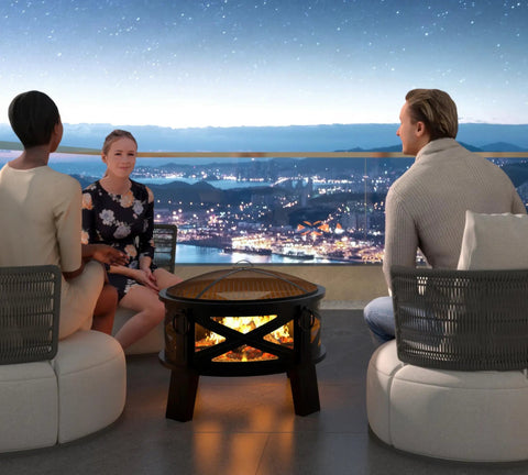 Heavy Duty Portable 26 Inch Steel Fire Pit With Grill Grate And Spark Screen in outdoor setting with people gathered around.