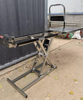 Rock Solid Heavy Duty Electric Hydraulic Scissor Lift Table Cart 660 Pounds Capacity Premium Stainless Steel Platform side view outdoors