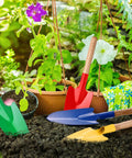 12 Pack Kids Garden Shovels Set With Wooden Handles in use, showing mini metal shovels for soil planting among potted plants