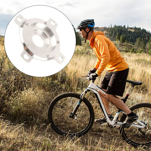 Cyclist on trail with inset of Universal Bike Chainring Adapter for DIY Upgrades, CNC 104 BCD, 14x11x2 Mm, aluminum wheel.
