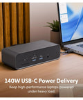 Badass Thunderbolt 5 Dock With Built In Ssd Enclosure, 120Gbps Desktop Hub For Mac And Pc, triple 4K output, seen next to a laptop.