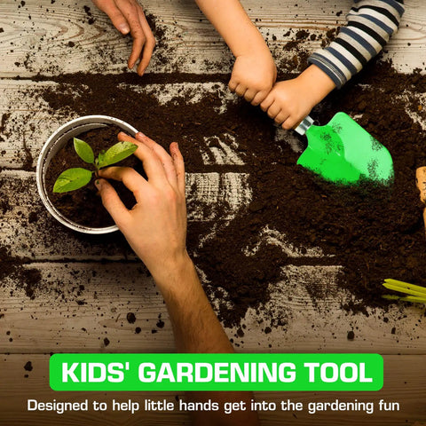Child using green Kid Friendly Garden Trowel With Wooden Handle Mini Shovel For Children Durable Green Tool For Planting Transplanting Weeding And Soil Scooping A Scaled Down Version Of An Adult Trowel in soil with adult nearby.