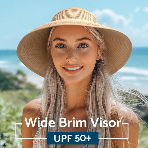 Woman wearing Women's Wide Brim Packable Straw Hat With Ponytail Opening For Beach And Travel Roll Up Sun Visor under clear sky