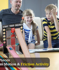 Family using Hands On Motion And Friction STEM Kit For Kids Ages 5 To 12, 21 Piece Physics And Engineering Set with wooden ramp.