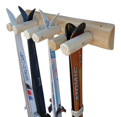 Built Tough Game Changing Heavy Duty Solid Wood Log Style Wall Mount Ski Rack Holds Six Pairs Of Skis And Poles Indoor Garage Wall Space Saver Organizer Rack Natural Finish with skis organized on holders.