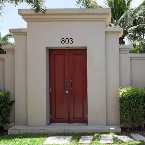 Entrance with a modern 8 Inch Floating House Number 1 Easy To Read From Street Modern Metal Mount above red double doors.