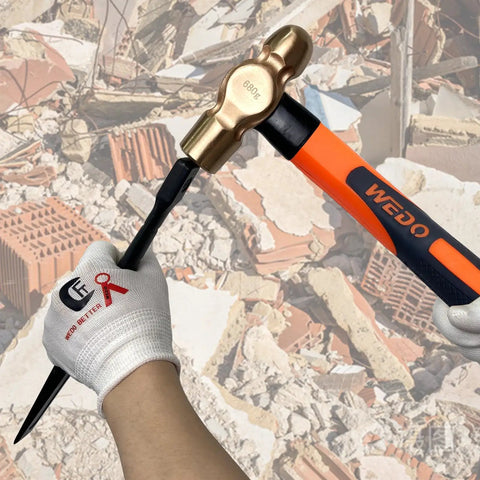 Worker using Beryllium Copper Ball Pein Hammer from 36 Piece Non Sparking Tool Set For Pro Grade Jobs in construction site