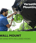 Man mounting 40V 10 Inch Hybrid Fan With 5 Speed Settings And 360 Degree Rotating Head Delivering Up To 785 CFM Airflow Cordless And AC DC Power Charger Included Battery Not Included Perfect For Garage Workshop And Home Use under open car hood