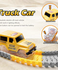 Yellow truck car on flexible track from Glow In The Dark Construction Race Track Set For Kids Ages 3 To 9, 264 Piece Buildable DIY Track