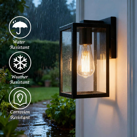 Exterior Wall Lantern Outdoor Sconce For Porch And Patio Lighting with black finish, illuminated at night in rainy weather