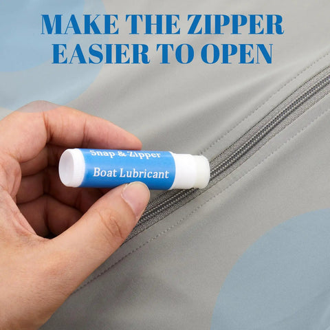 Hand applying Six Pack Zip Lubricant Wax For Smooth Zippers On Boats Vinyl Panels Canvas Bimini Backpacks Jackets Wetsuits Drysuits Marine Gear Maintenance For Effortless Opens, showing ease of use.