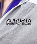 Augusta Sportswear Brands logo on patterned fabric close-up