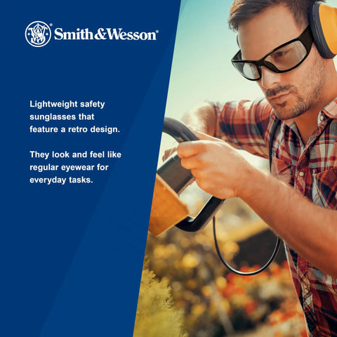 Top Shelf 12 Pack Anti Fog Safety Glasses With Clear Lens And Black Frame Lightweight Unisex Impact Resistant Eye Protection Shooters Swear By For The Range And Workshop, worn by a man using a tool outdoors.