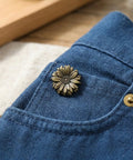 Antique Bronze Metal Snap Buttons Set Ten Pieces Durable Zinc Alloy Fasteners For Leather Craft Handbags Purses Bags Clothing DIY With Vintage Look And Rust Proof Finish installed on denim pocket