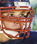 Football player wearing helmet with 20 Pack Football Mouth Guards With Strap Black Adult Size Bulk Mouthpieces visible.