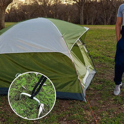 Tent secured with 200 Pack 8 Inch Landscape Staples Heavy Duty 11 Gauge Galvanized Steel Garden Stakes U Shaped Pins shown in use.