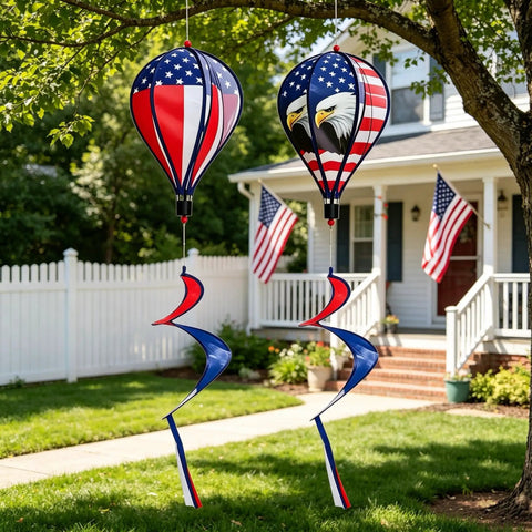 All American Patriotic Wind Spinner Duo with flag and bald eagle designs hanging in garden for 4th of July decor
