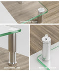 Close-up of 2 Pack Adjustable Monitor Riser Stand For Desk With Height Elevation Ergonomic Lift, showing reinforced glass, adjustable legs, and rubber stabilizer.