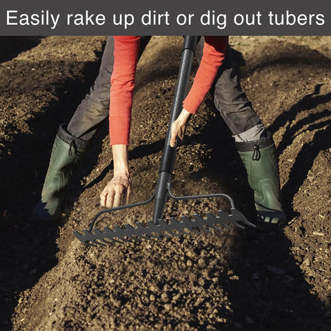 Person using Heavy Duty Metal Garden Rake With 17 Prongs, 17 Inch Wide And 50 Inch Long Handle to clear soil in garden.