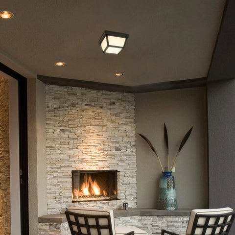 9 Inch Black LED Outdoor Ceiling Light With Frosted Lens, 3000K Warm White, 1000 Lumens, Wet Rated mounted on a porch ceiling
