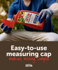 Person wearing gloves pouring Garden Insect Killer Concentrate 32 Oz Easy To Use Mix With Water and Spray Kills 500 Plus Pests