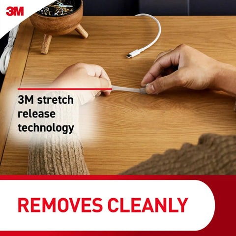 Person using Round Cord Clips For No Tool Cable Management Clear Damage Free Hanging Wall Clips pack on wooden desk.