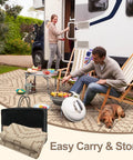 Outdoor Waterproof Plastic Straw Rug 8x10 for RV Camping, showing beige and brown reversible design with people relaxing on it.