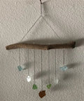 Hanging sea glass mobile with driftwood and chains for decoration