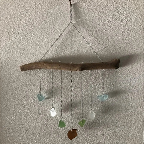 Hanging sea glass mobile with driftwood and chains for decoration