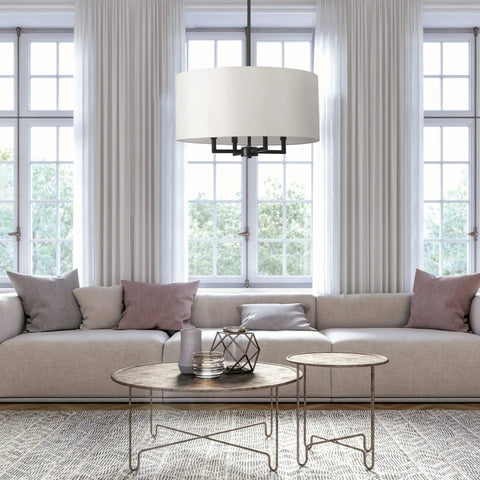 Four Light Matte Black Chandelier With Beige Fabric Shade Modern Farmhouse Hanging Light shown in a bright living room setting