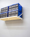 American Made Universal Garage Storage Wall Mount Kit 4 Foot Beefy System Holds 650 Pounds Per Section Easy One Person Install Includes All Assemblies And Fasteners No Lumber Required, mounted on wall with blue storage bins