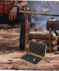 Open Three-Piece Survival Storage Case Set for Outdoor Junkies next to campfire, showcasing shockproof interior compartments.