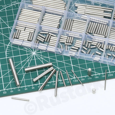 100 Pcs M6 Stainless Steel Dowel Pin Kit With 11 Sizes From M6x6mm To M6x45mm displayed on a cutting mat