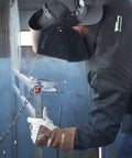 Welder using 7018 Welding Rod 3/32-Inch 5-Pound All Position Low Hydrogen Shielded Metal Arc in a fabrication project