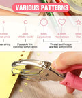 Five Piece Handy Handheld Hole Punch Set with pink soft grip punching star shape into yellow paper for scrapbooking projects