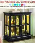 30 Inch Glass Curio Display Cabinet With LED Lighting and two lattice doors in black showcasing tableware and collectibles.