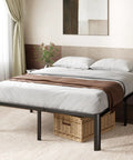 Heavy Duty Steel Platform Bed For Full Size Mattresses with brown throw, gray bedding, and storage basket beneath.