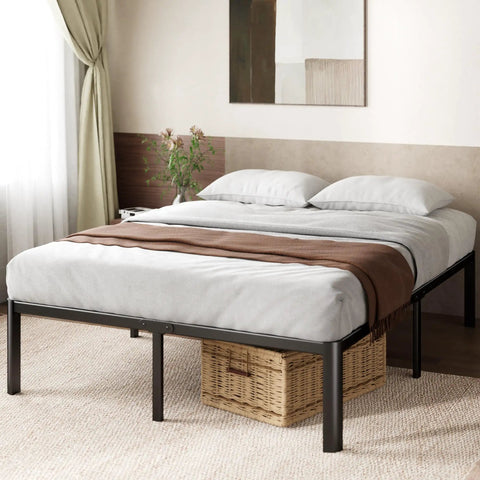 Heavy Duty Steel Platform Bed For Full Size Mattresses with brown throw, gray bedding, and storage basket beneath.