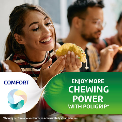 A woman enjoying food at a gathering, highlighting the benefits of Original Denture Adhesive Cream With Strong All Day Hold No Slip Grip Food Seal And Comfort Zinc Free Mint Flavor Two Point Four Ounce Tubes Four Pack Great For Daily Wear And Reliable Smile Security All Day Long.