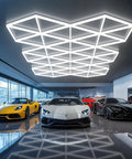 Hexagonal LED Garage Light Kit 71 Pack Mega Bright 710W 78100LM Energy Efficient Honeycomb Ceiling Lights in car showroom