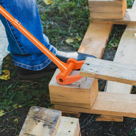 Beefy 48 Inch Decking Pry Bar And Pallet Buster With 110 Degree Head Heavy Duty Carbon Steel Demolition Tool For Deck Boards Pallets And Standing Hardwood Pry Lift And Demolish With Less Back And Knee Strain Orange in use prying a deck board