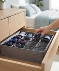Foldable Oxford Fabric Closet Organizers For Socks And Underwear With Multi Compartments sorting rolled socks in a drawer.