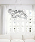 Hella Sharp Six Light Ceiling Pendant With Glossy Polished Chrome Trim And Classic Beveled Crystal Glass Shades above a white sofa in modern living room.