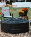 Surround Shelter Small Fire Pit Surround Cover for heavy duty weatherproof protection on outdoor patio with chairs and flowers.
