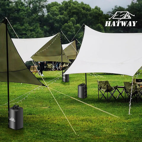 Heavy Duty Canopy Water Weights 88 Lbs Set Of 4 secured on tent legs at an outdoor setting