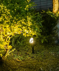 Close-up of 8 Pack Low Voltage 12V Landscape Light with 20W Halogen Flood Spotlight illuminating garden greenery