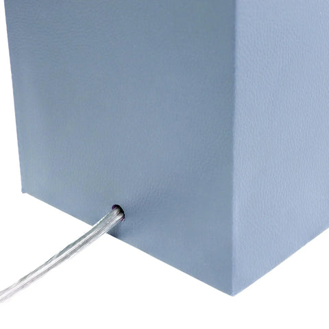 Close-up of Leather Wrapped Table Lamp With White Rectangular Fabric Shade In Hot Pink Modern Dope Design For Living Room Or Office Lightweight Yet Durable MDF And Metal Base showing cord insertion on base.