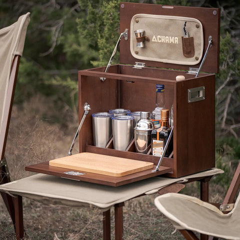 Sundowner Portable Travel Bar Kit with handcrafted wooden case, tools, tumblers, and shaker for camping or travel, open view.