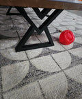 Diamond Shape Black Metal Desk Legs 16 Inch Set Of 2 for Coffee Tables Industrial Modern Base under a table on patterned carpet